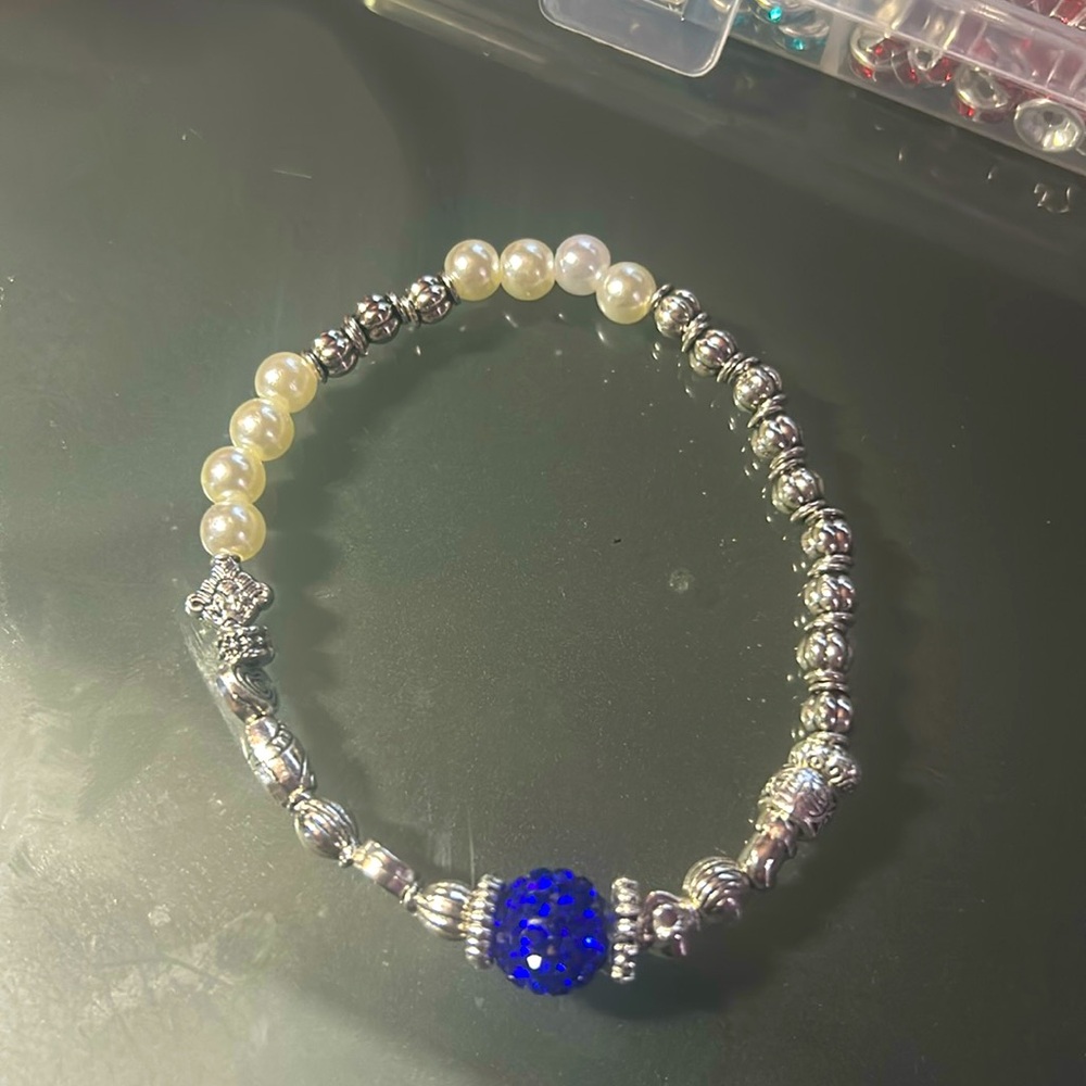 Silver, Pearl bracelet with red,blue,silver Rhinestone
